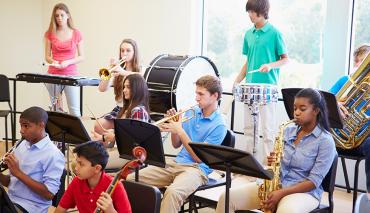 Children playing in school band